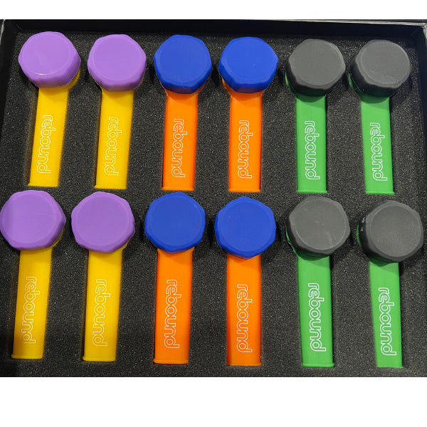 An array of silicone pipes with various colors including purple, blue, green, yellow, orange, and gray. Each pipe has a metal bowl attachment and a cap.
