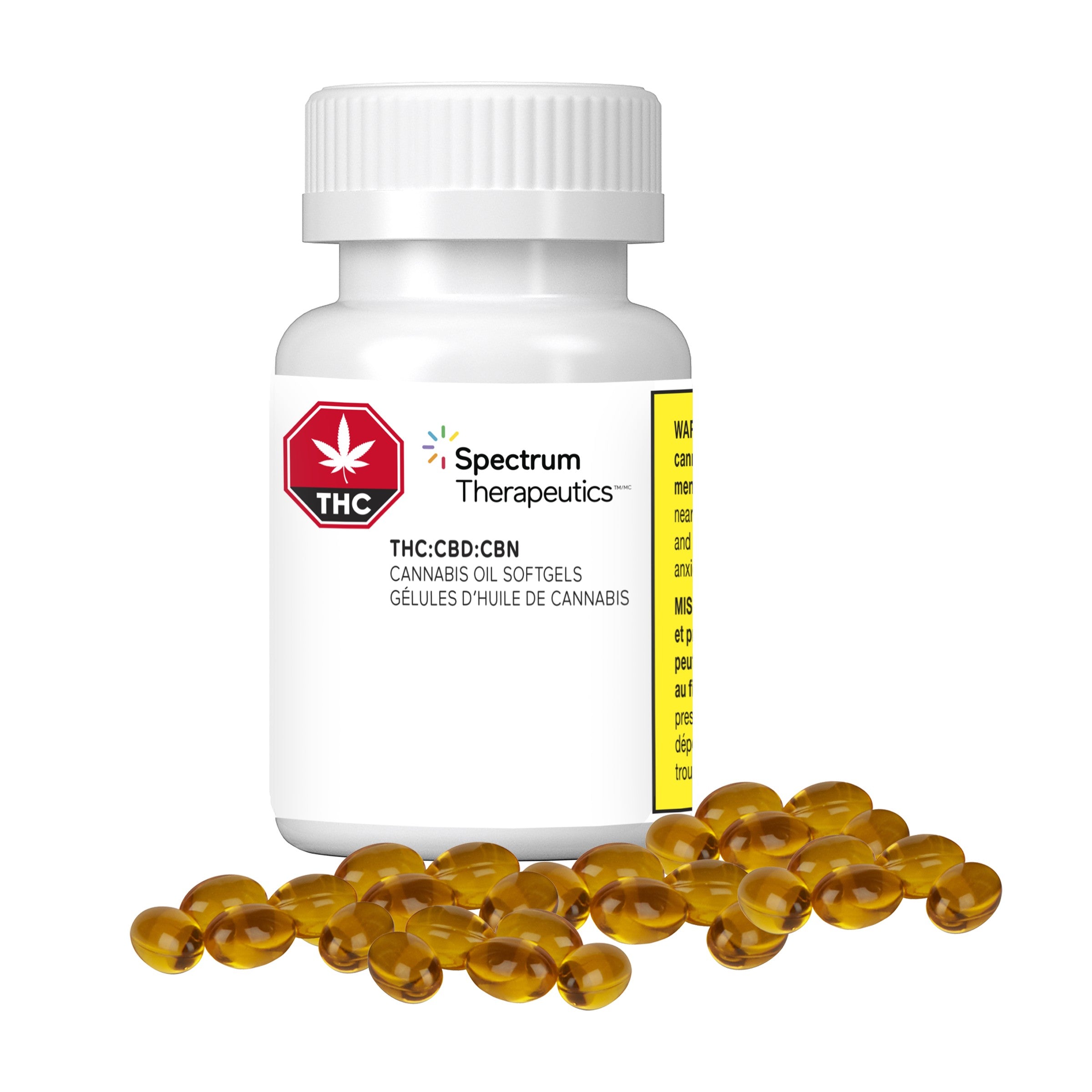 A bottle of Spectrum Therapeutics softgels with a label indicating a cannabis oil product containing THC, CBD, and CBN. The bottle is accompanied by several capsules spilling out in front of it.