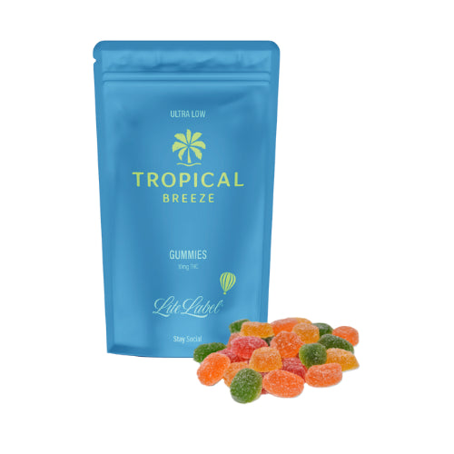 A blue package labeled 'Tropical Breeze Gummies' with an image of various colorful gummy candies in front of the package.