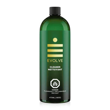 A green bottle of Evolve Clean Glass Cleaner with a white and yellow label, containing 16oz of liquid.