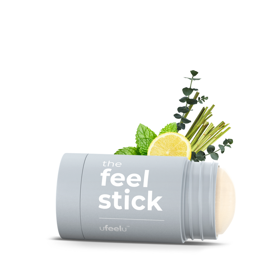 Product packaging labeled 'the feel stick' with natural elements on a white background