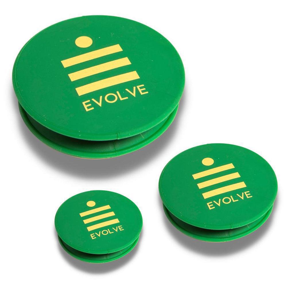 A set of green silicone end caps with the brand name 'Evolve' printed in yellow.