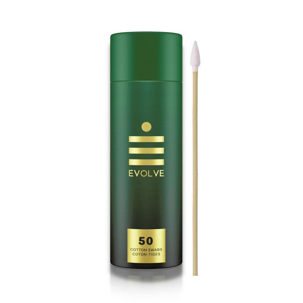 A green cylindrical container labeled 'Evolve' with a number 50 on it, beside a single white cotton swab