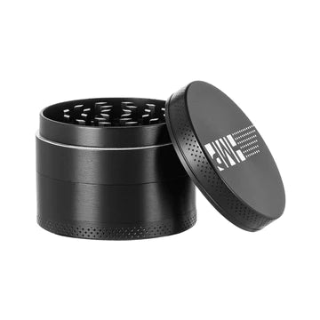 A black HMP medium grinder with a magnetic cap and a visible holding chamber, designed for grinding herbs or spices.
