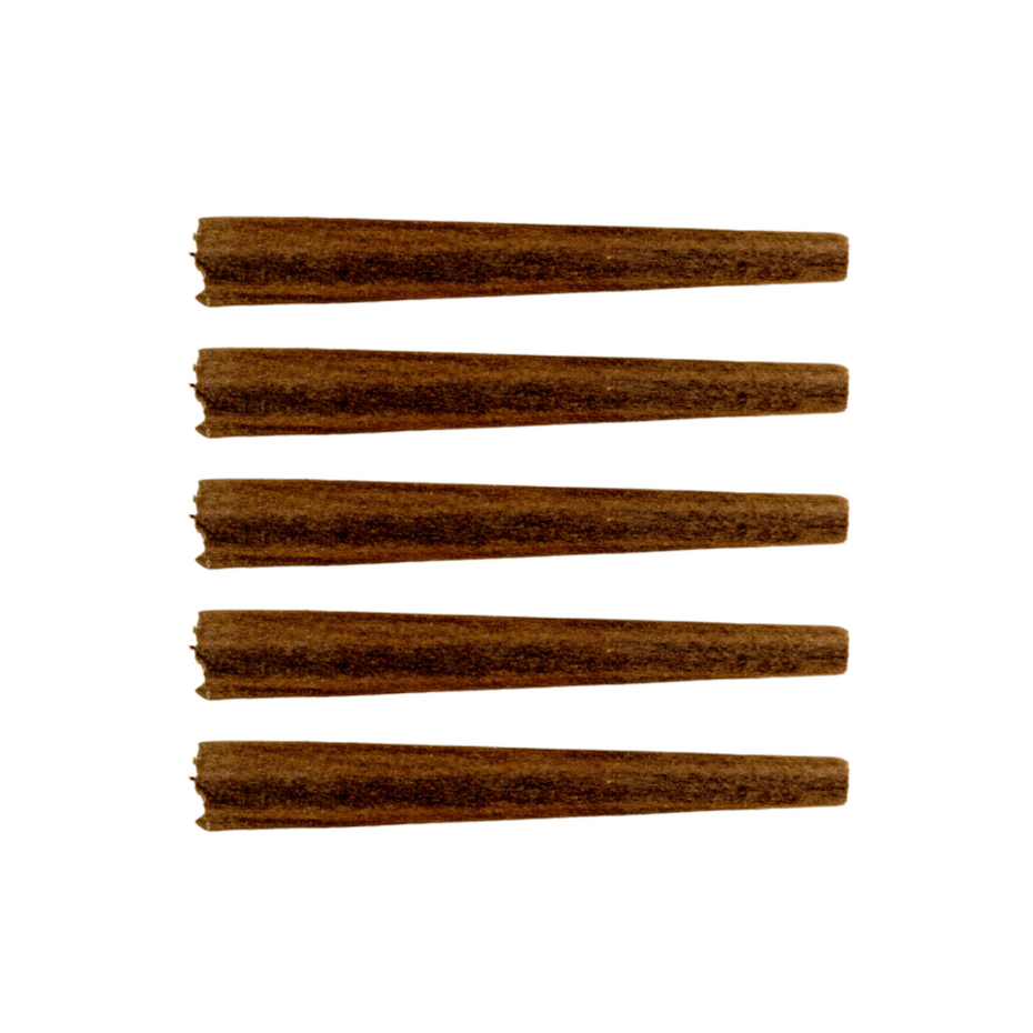 Four cylindrical objects on a white background, representing pre-rolled blunts.