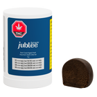 Jublee THC Extracts container with a cannabis leaf logo and a dark brown hash product on a white background.