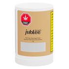 Jar of jublee THC extracts with a white label on a white background