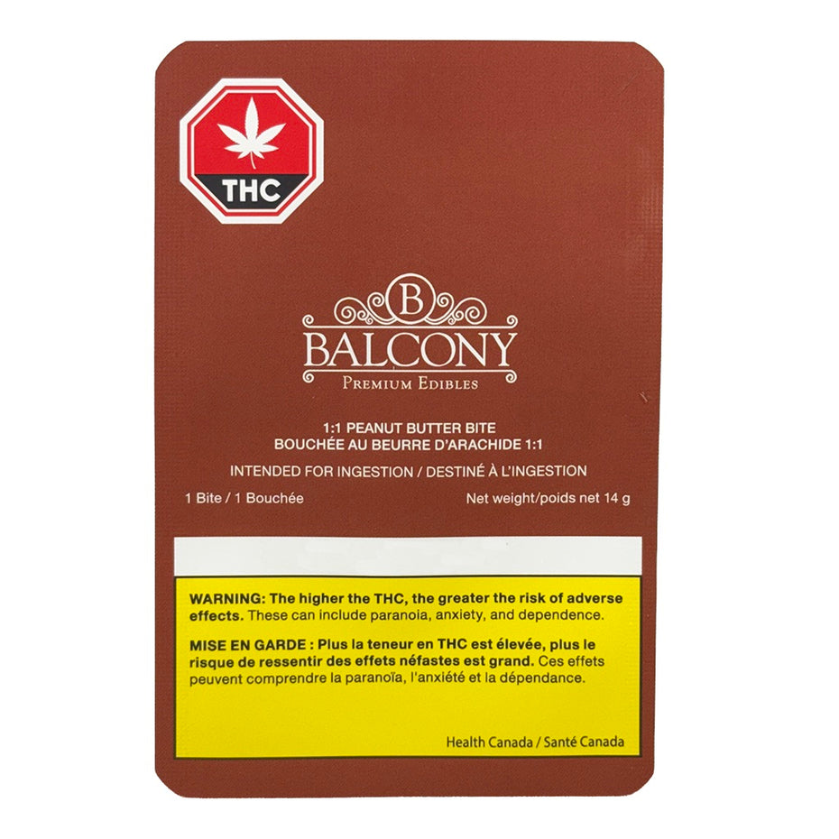 A brown rectangular package card for balcony premium edibles, featuring a red THC warning seal at the top left, white branding text, and a yellow warning panel at the bottom, shown on a plain white background.