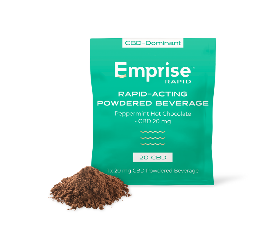 Green package of Emprise Rapid powdered beverage with a small pile of brown powder on a white background