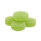 Four round, lime-green sugar-coated gummies stacked in a pyramid on a solid white background.