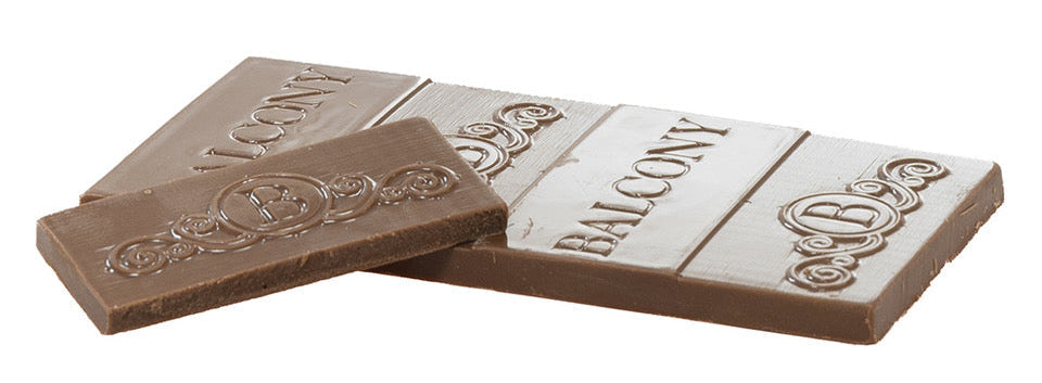 Two chocolate bars with 'Icon' and 'Balcony' branding on a white background