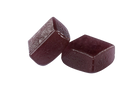 Two dark purple square-shaped tablets on a white background