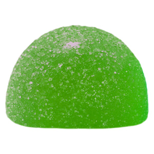 Green gummy candy with white specks on a white background