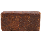 Rectangular block of dark chocolate on a white background