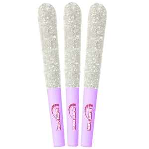 Three glittery tools with purple handles on a white background