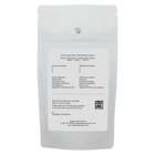 Back of a white cannabis packaging with text and QR code on a white background