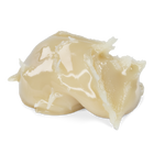 A scoop of creamy,live hash rosin a glossy, semi-translucent texture, photographed on a solid white background.