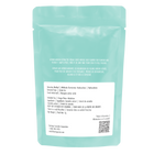 Mint green package with text and a QR code on a white background