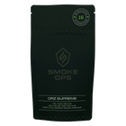 A black stand-up pouch package for Smoke Ops Orz Supreme CBD, featuring a circular '1G' purity seal at the top right and product details at the bottom, shown on a plain white background.