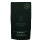 A black stand-up pouch package for Smoke Ops Streudlez, featuring a circular green and white '16+ Quality Check' seal in the top right corner and product details at the bottom, set against a plain white background.
