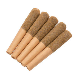 Set of five beige and brown cylindrical objects on a white background