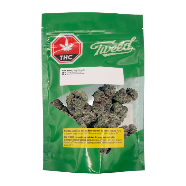 Green package of Tweed cannabis with visible THC symbol on a white background