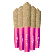 Five cosmetic applicators with pink handles and cork tips on a white background
