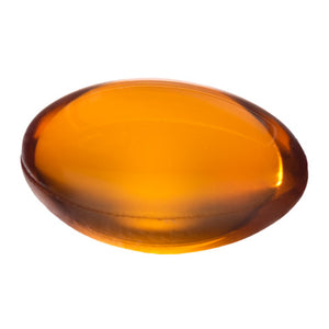 single softgel on white background