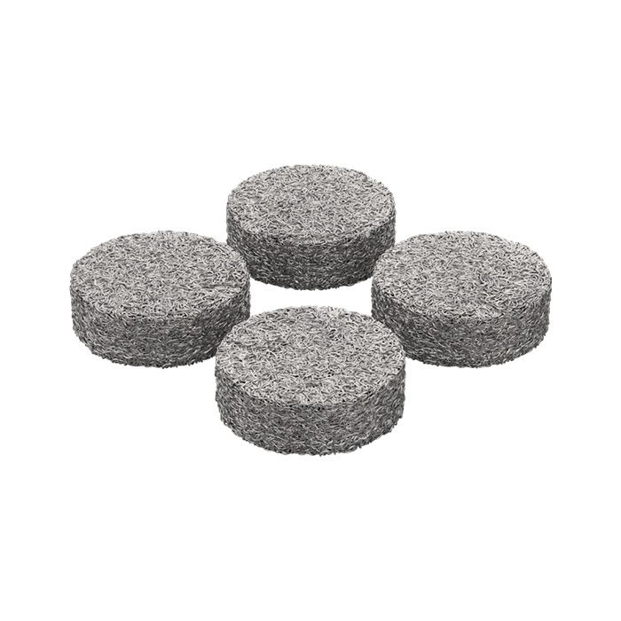 A set of four small, round, grey filling pads designed for use with a vaporizer.