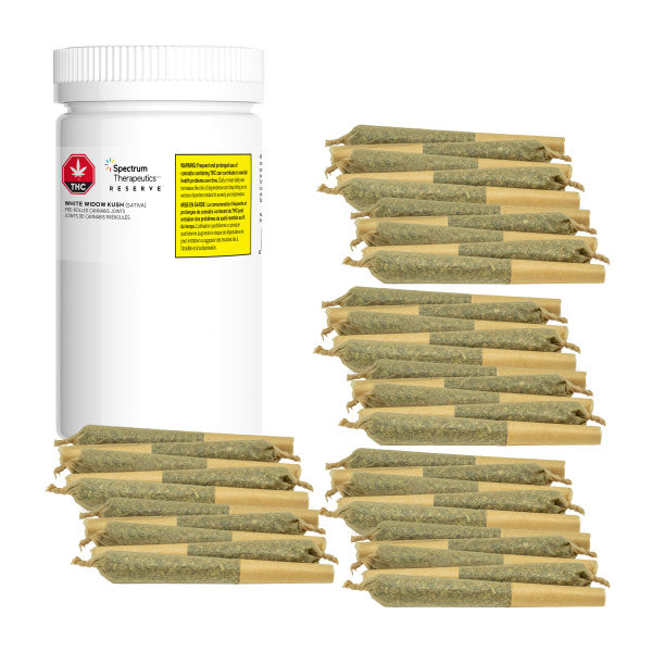 The image shows a bottle of Spectrum Reserve White Widow Kush pre-rolls alongside multiple individual pre-rolls, displaying the product in a state of readiness for consumption.
