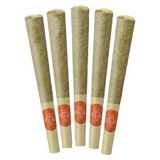 Five rolled joints with red labels on a white background
