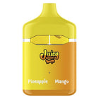 Disposable vape pen with yellow and orange coloring, labeled 'Juicy Hoots' with flavors 'Pineapple' and 'Mango' indicated