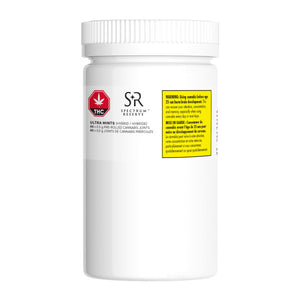White container with a label featuring the Spectrum logo on a white background