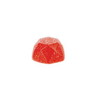 Red gemstone-like candy on a white background