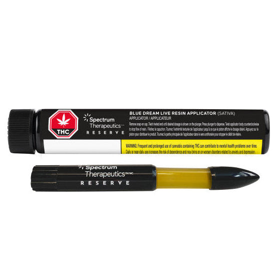 Two cannabis product applicators with 'Spectrum Therapeutics Reserve' branding on a white background.