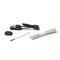 A collection of accessories laid out on a white background, including a black USB charging cable with a magnetic charging dock, a small black rubber or silicone piece, a bundle of beige cotton wick-like strings with red specks, and a small metal cleaning brush.