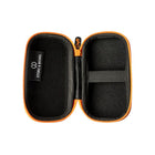 A black and orange Storz & Bickel Crafty travel case with a hard shell and a zipper open to show case holding features