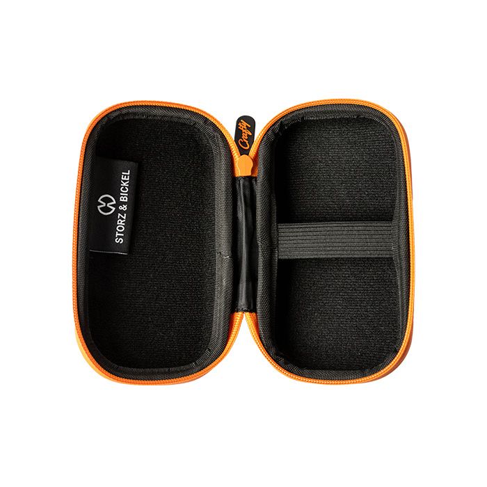 A black and orange Storz & Bickel Crafty travel case with a hard shell and a zipper open to show case holding features