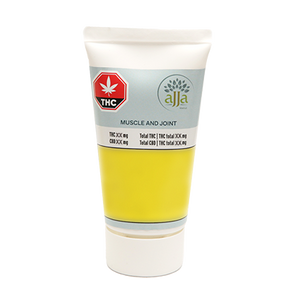 A tube of Ajja Muscle and Joint Cream with a label indicating it contains CBD and THC for muscle and joint support.