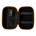 A black and orange Storz & Bickel Mighty Travel Case for carrying smoking devices and accessories that is open featuring compartments and secitons