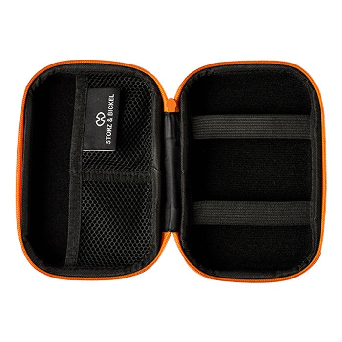 A black and orange Storz & Bickel Mighty Travel Case for carrying smoking devices and accessories that is open featuring compartments and secitons