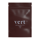 A sealed, dark red package of Vert Afghan Balanced Hash with white and silver text displaying the product name, strain, and weight (3.5g).
