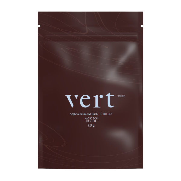 A sealed, dark red package of Vert Afghan Balanced Hash with white and silver text displaying the product name, strain, and weight (3.5g).