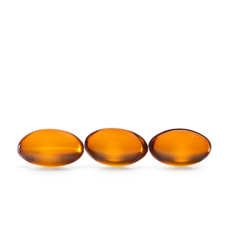 three orange capsules