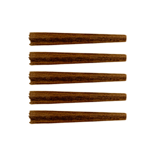 Four cylindrical objects on a white background, representing pre-rolled blunts.